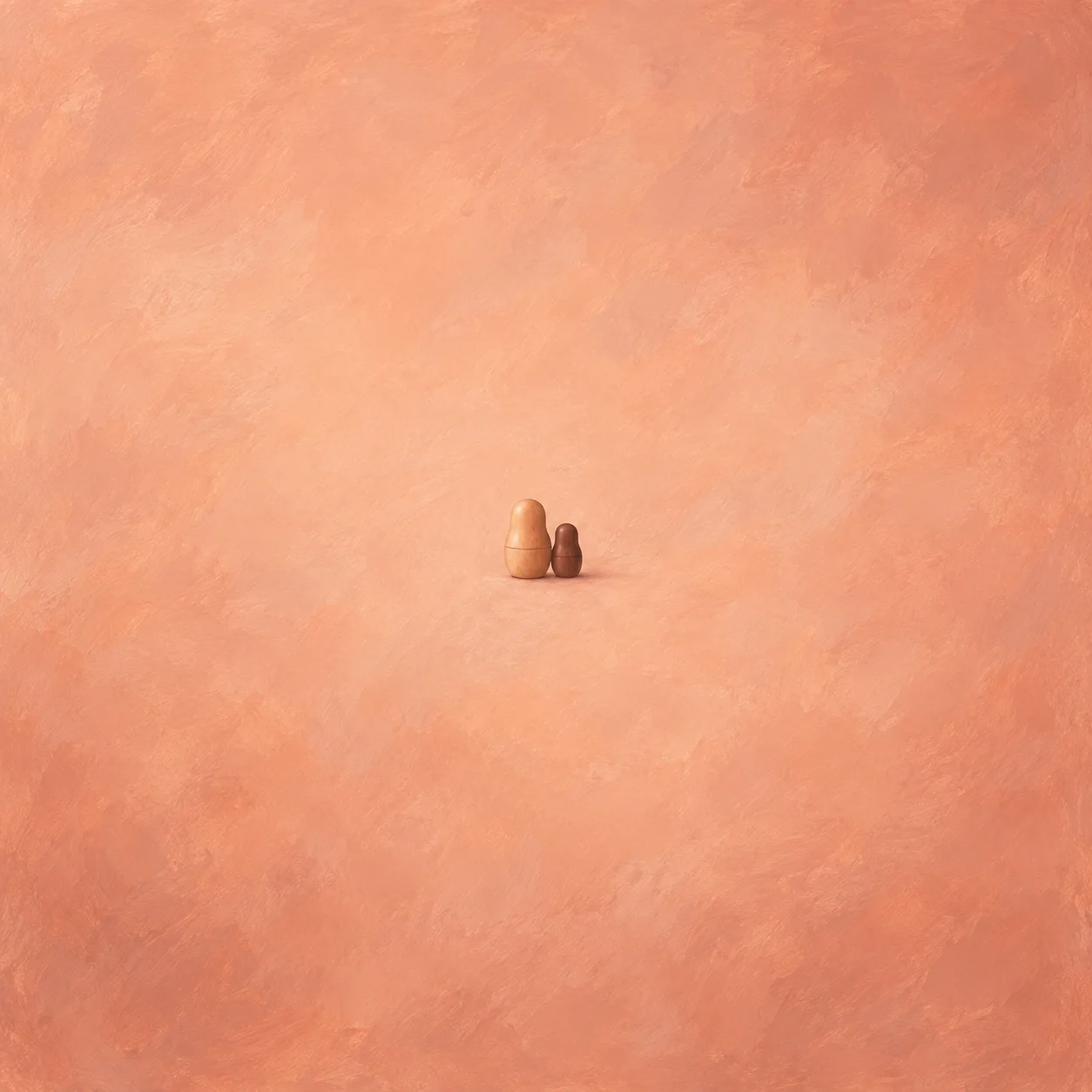 Two plain wooden nesting figures, a larger peach-toned figure beside a smaller mahogany figure, on a peach background.