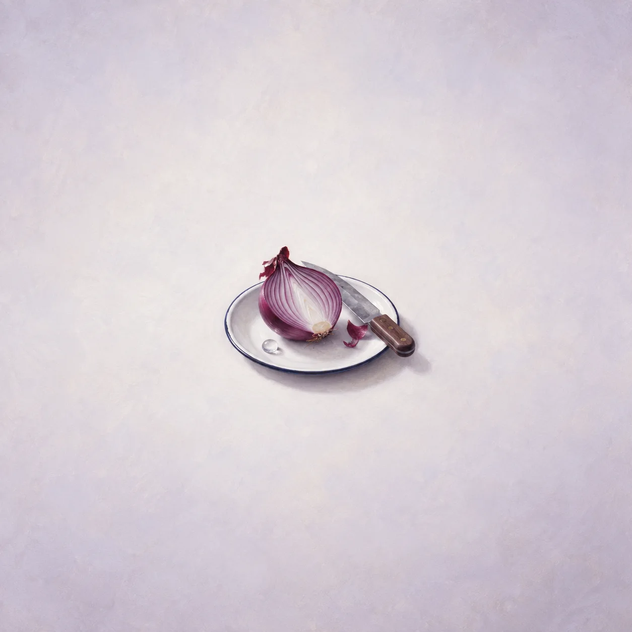 A halved purple onion on a white enamel plate with a single water droplet and a small knife blade.