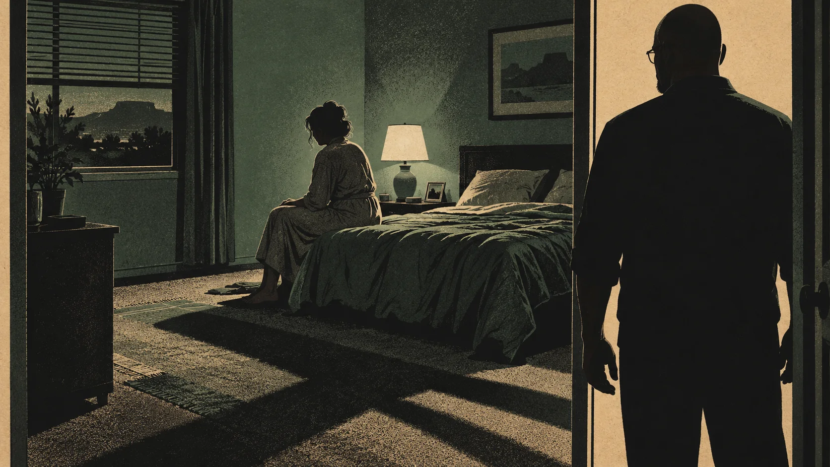 A bald man in glasses stands in shadow in a bedroom doorway while a woman sits on the edge of the bed under lamplight.