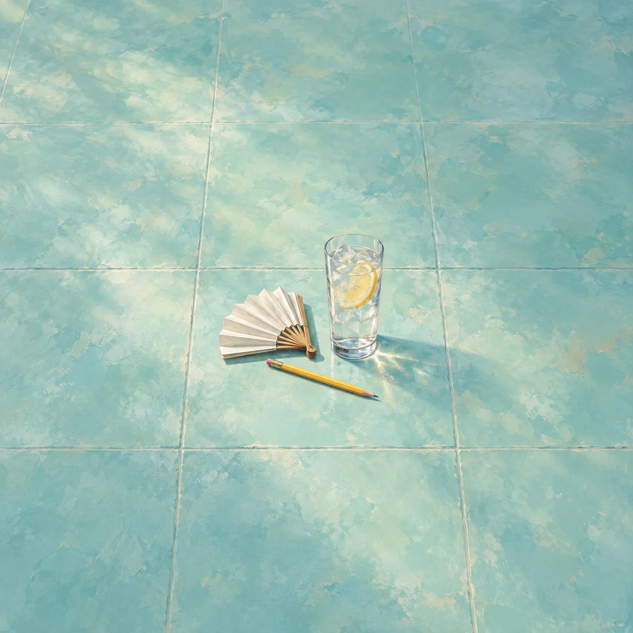 A yellow pencil and folded paper fan lie beside a glass of water with lemon on pale-blue tiles.