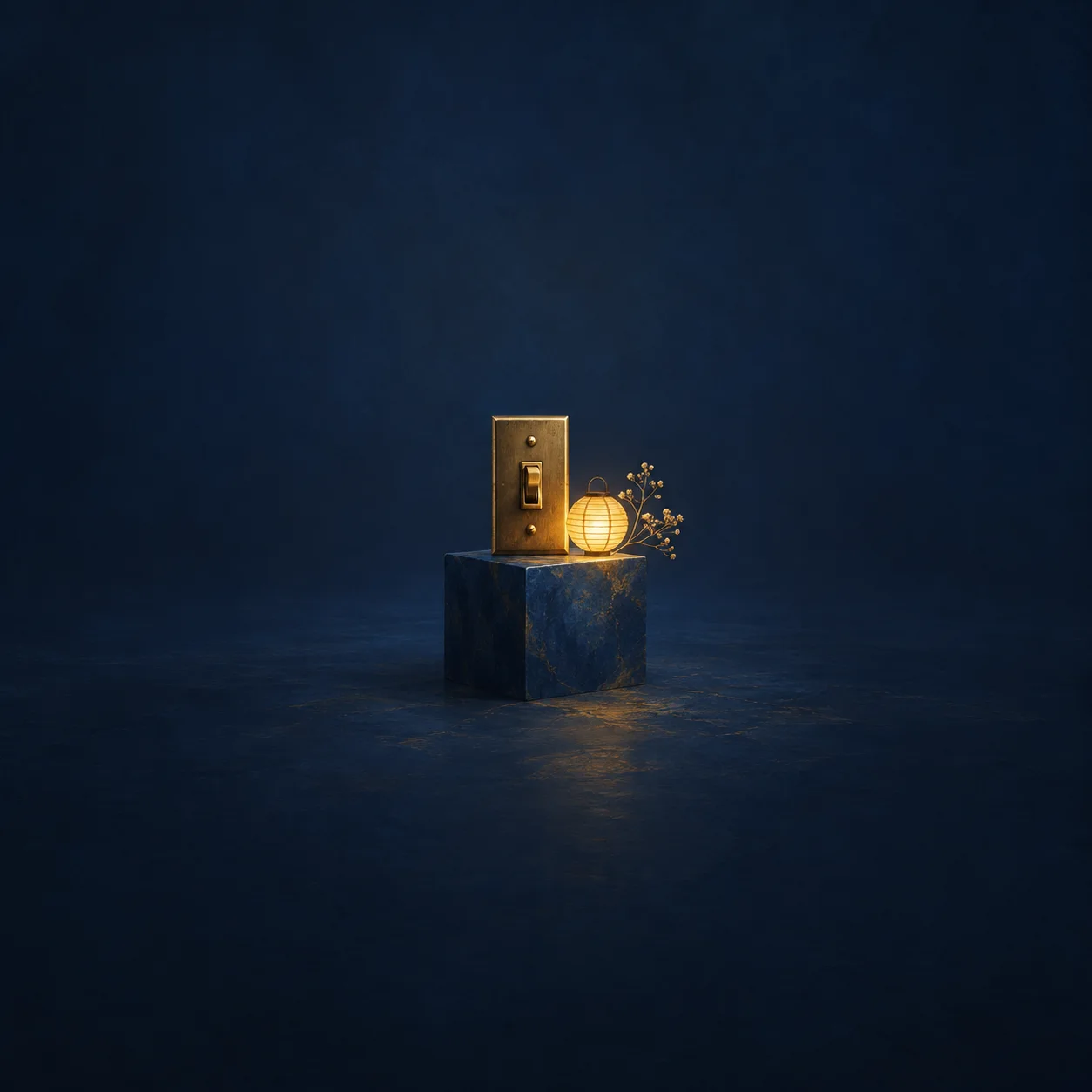 A brass light switch on a midnight-blue plinth beside a small glowing yellow lantern.
