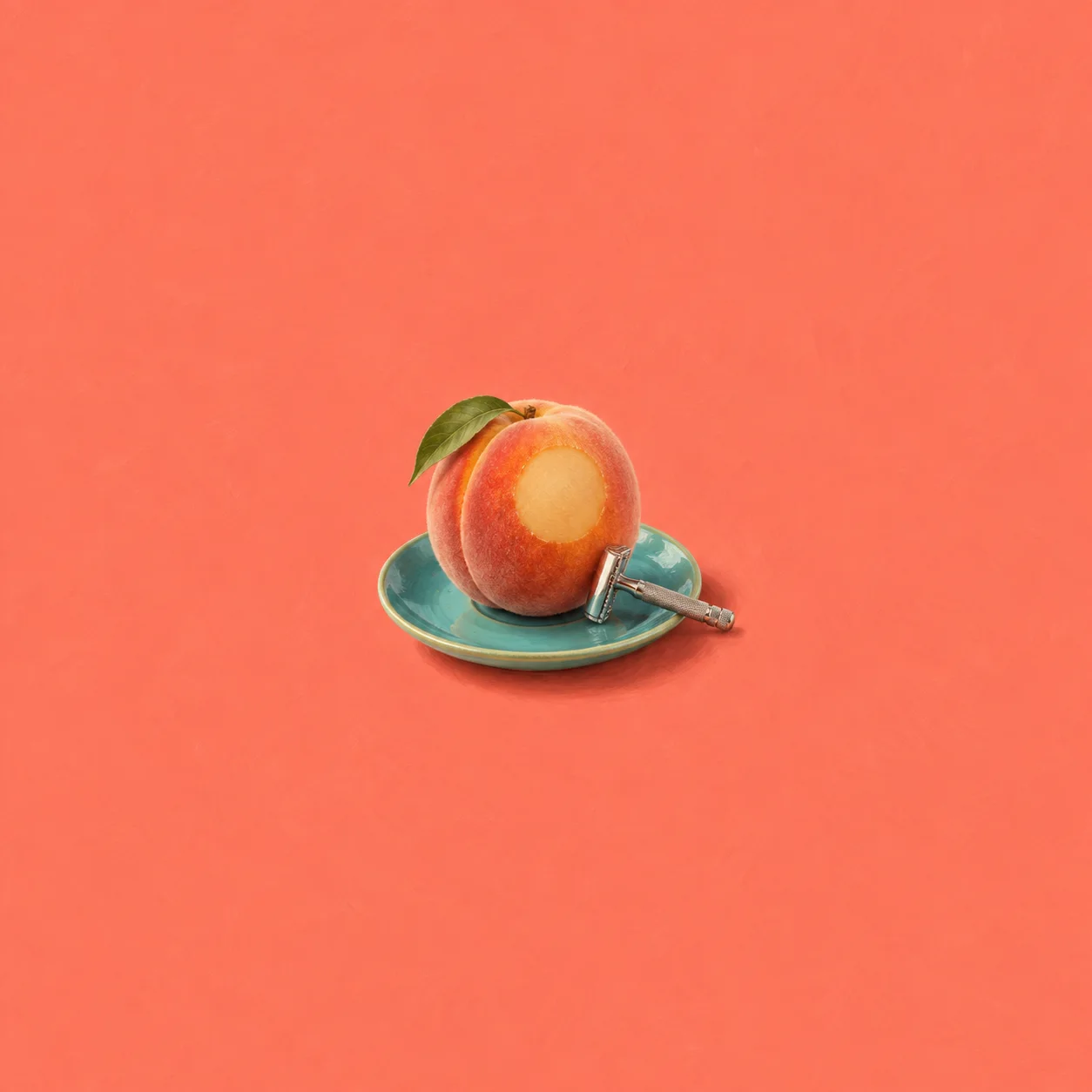 A peach with a smooth pale patch stands on a turquoise saucer beside a small silver razor.