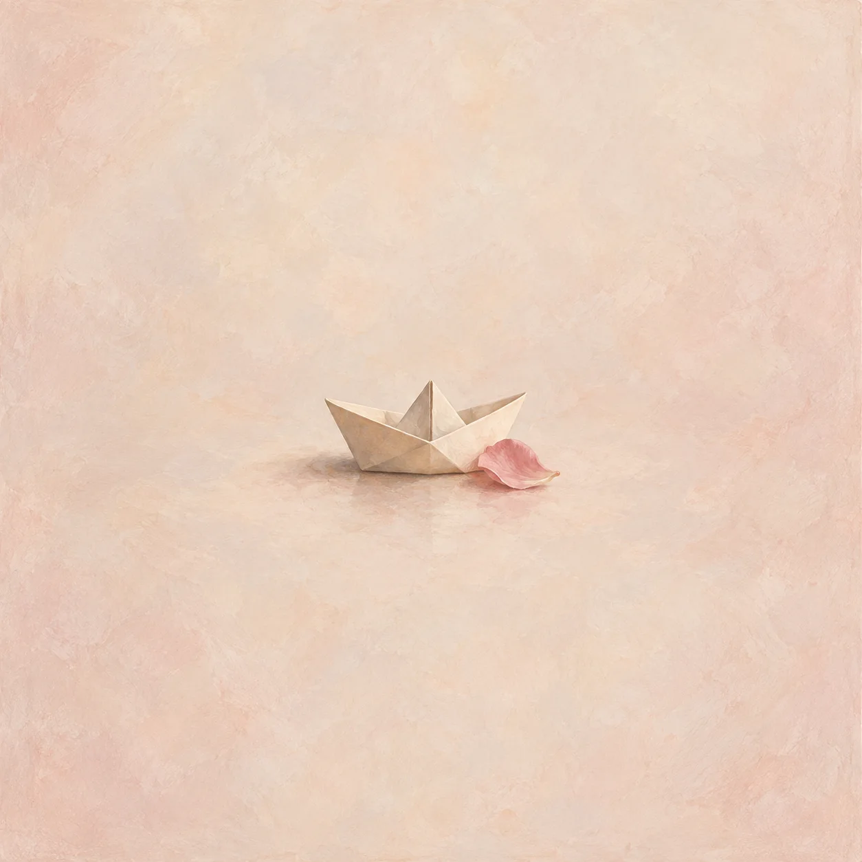 Small folded blank paper boat with a loose rose shell beside it