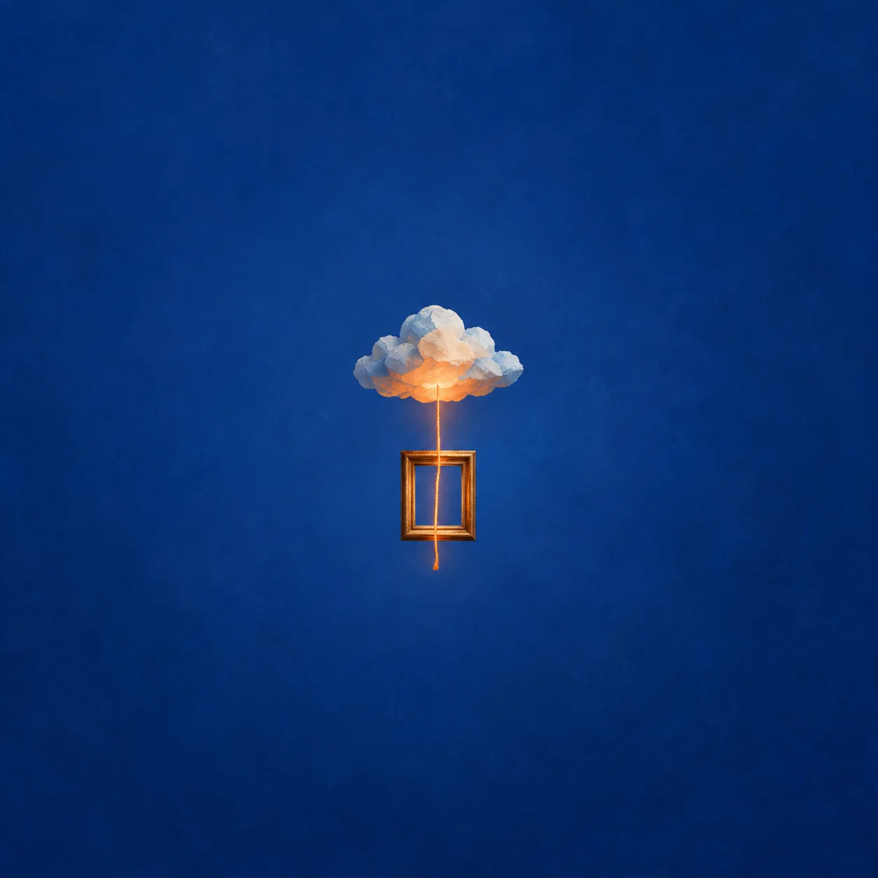 A small empty gold frame hanging beneath a softly glowing cloud, joined by an orange thread against a cobalt-blue background.