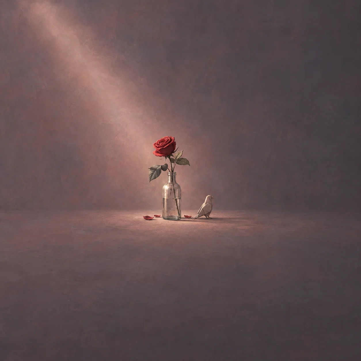 A red rose in a glass bottle beside a small pale bird and fallen petals.