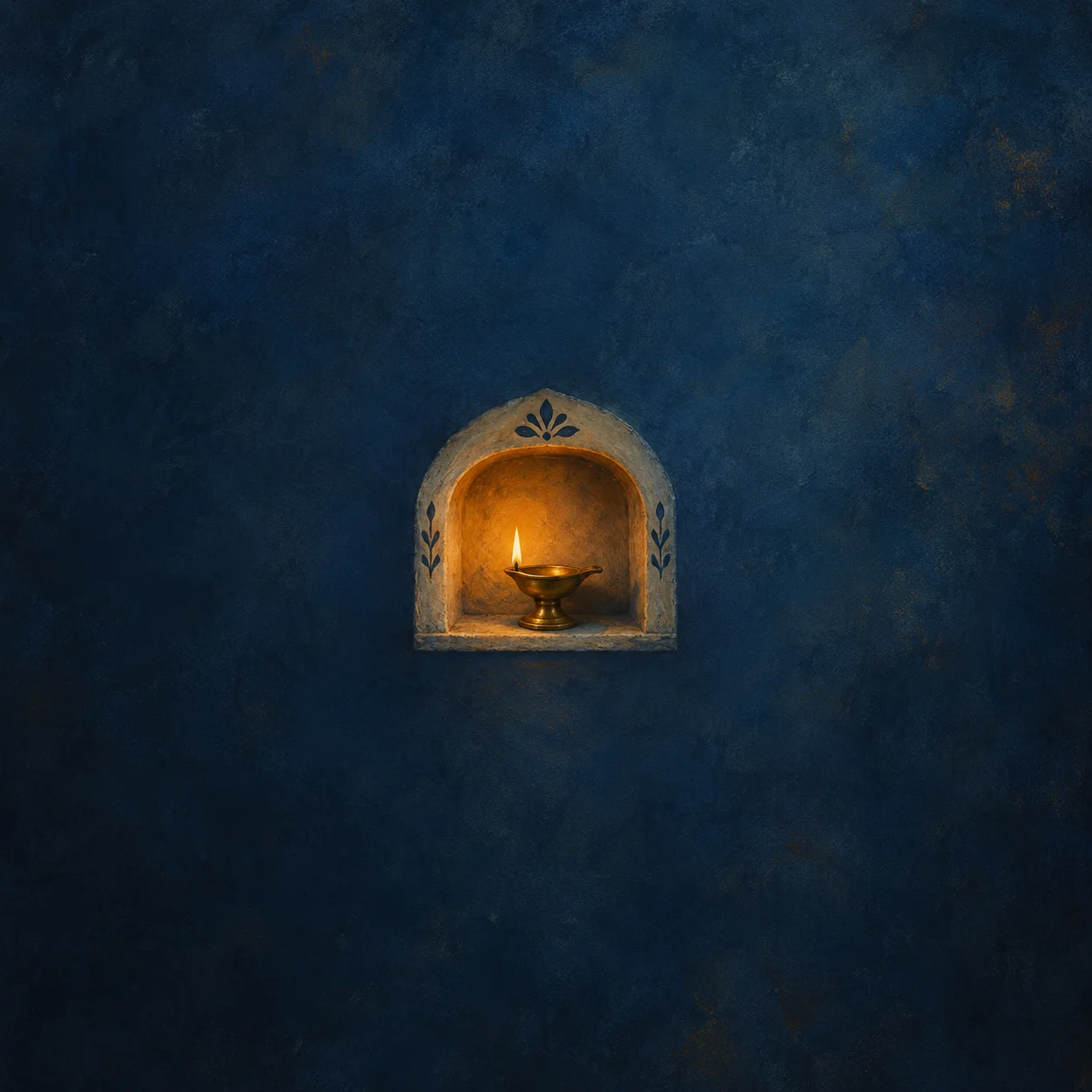 Faithful painterly brass oil lamp set inside a low ceramic alcove, indigo and amber