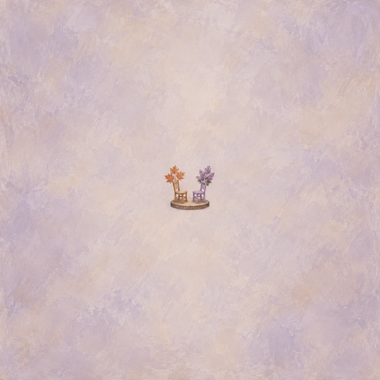 Two miniature wooden chairs facing each other on a round wooden base, one decorated with orange maple leaves and the other with lilac flowers.