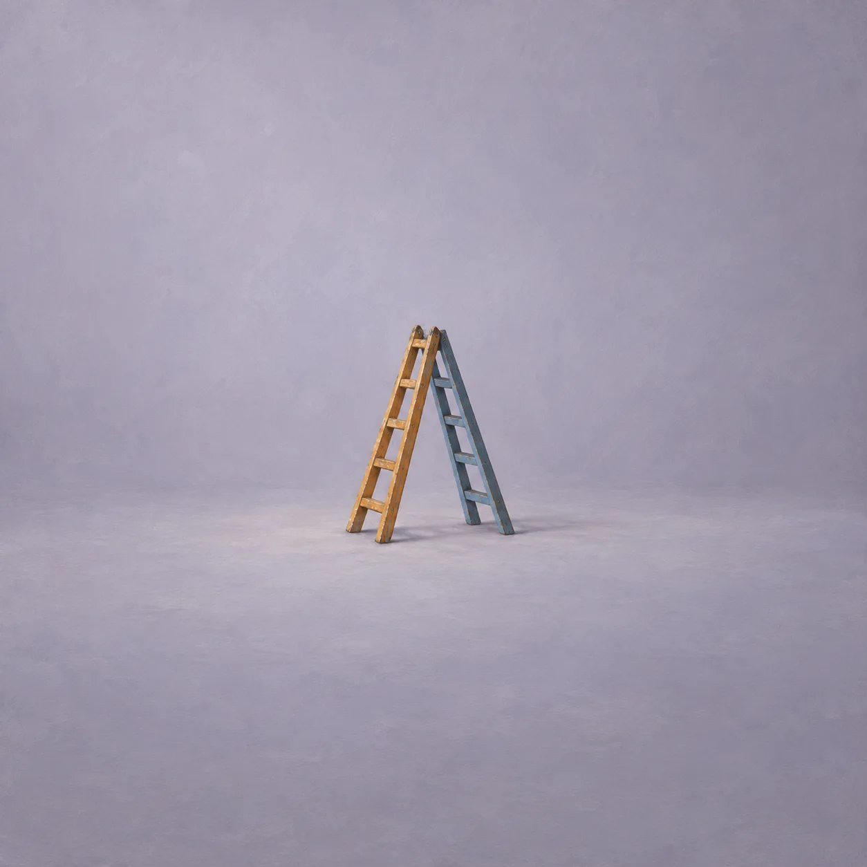 An ochre ladder and a blue ladder leaning together to form an A shape on a lavender-grey background.