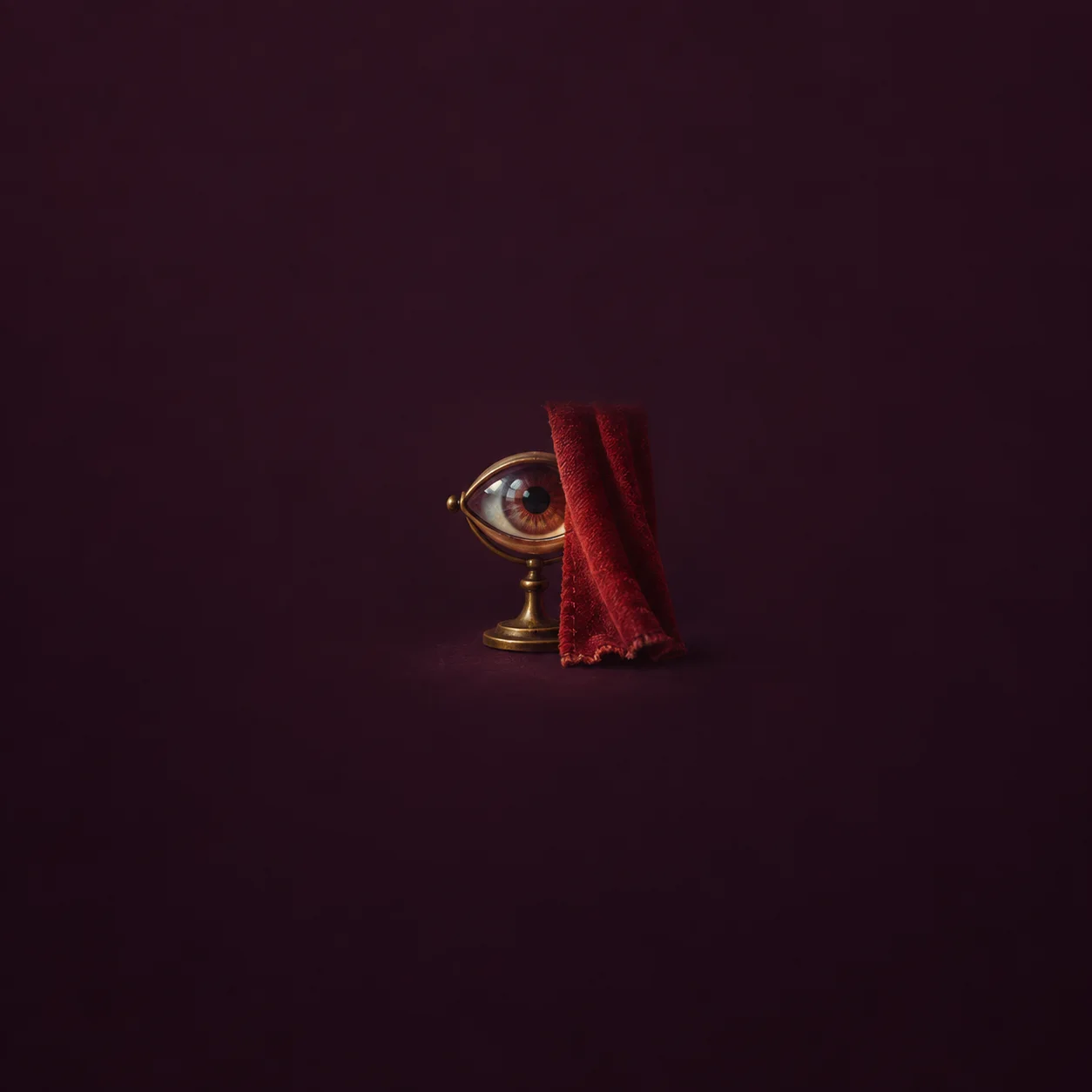 A large eye in a round lens on a brass stand peeks from behind a red velvet curtain.